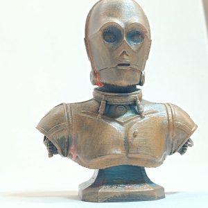 Photo de la statuette de C-3PO aspect Bronze Vieilli, vue de face sur fond neutre.