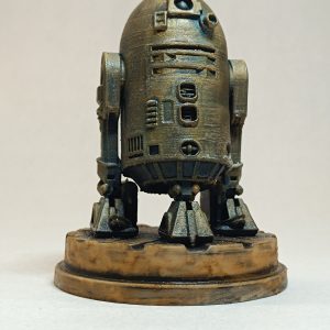 Figurine R2-D2 impression 3D aspect bronze antique finition main.