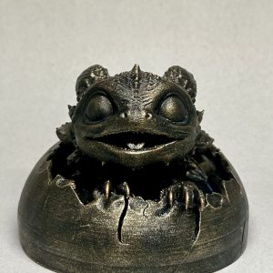 Bébé Dragon dans son Œuf – Figurine Décorative Effet Bronze